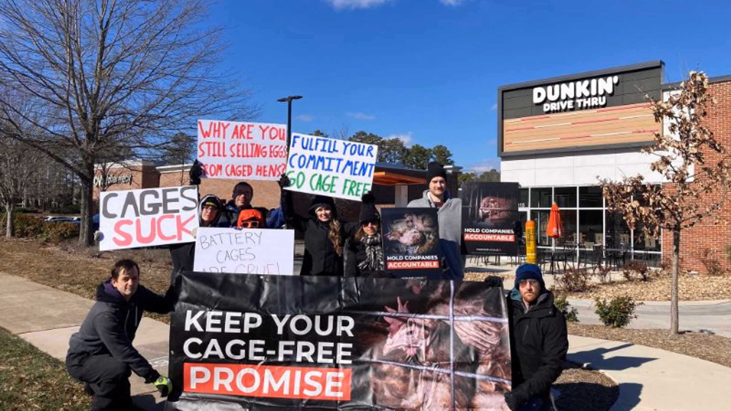 Battery cage protest against Dunkin' Donuts 🍩